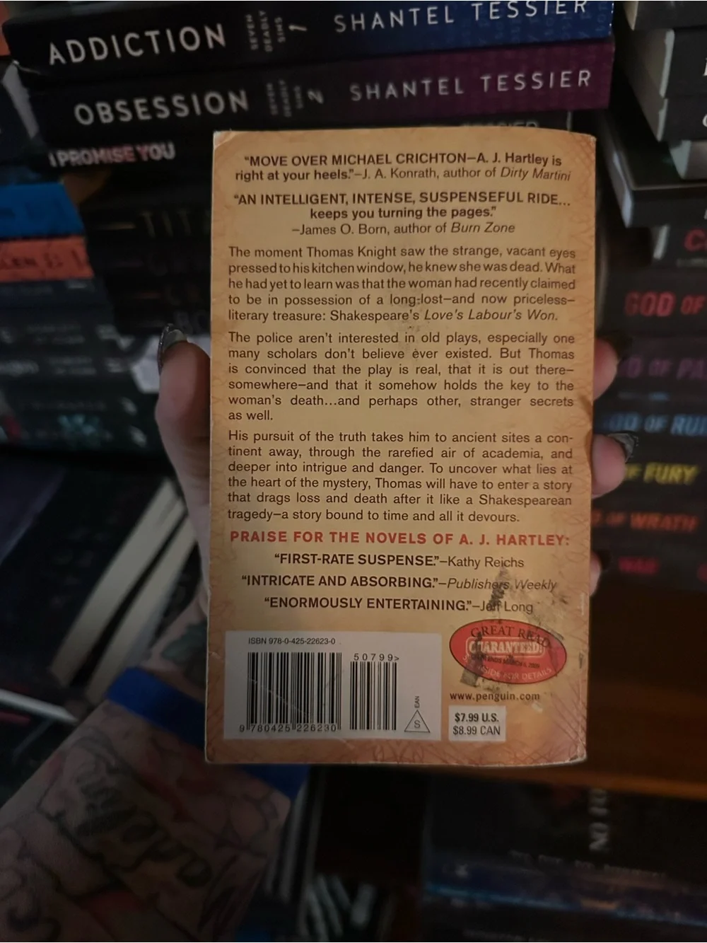 What Time Devours by A. J. Hartley - Beige/Red Paperback